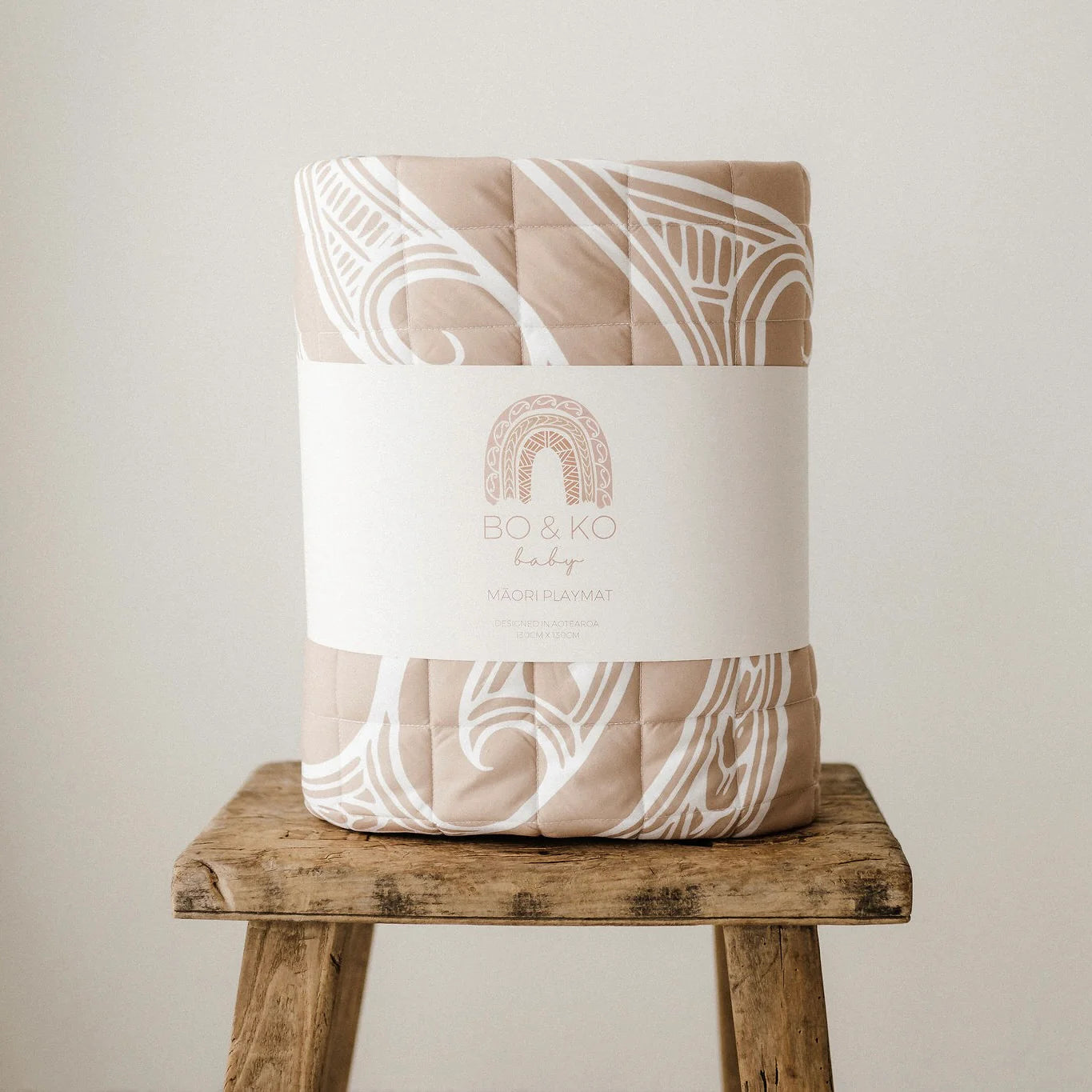 BO & KO Baby Māori Inspired Playmat | Tan available at Bear & Moo
