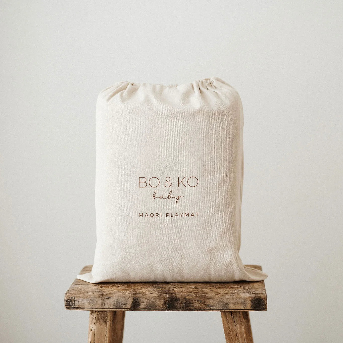 BO & KO Baby Māori Inspired Playmat | Tan available at Bear & Moo