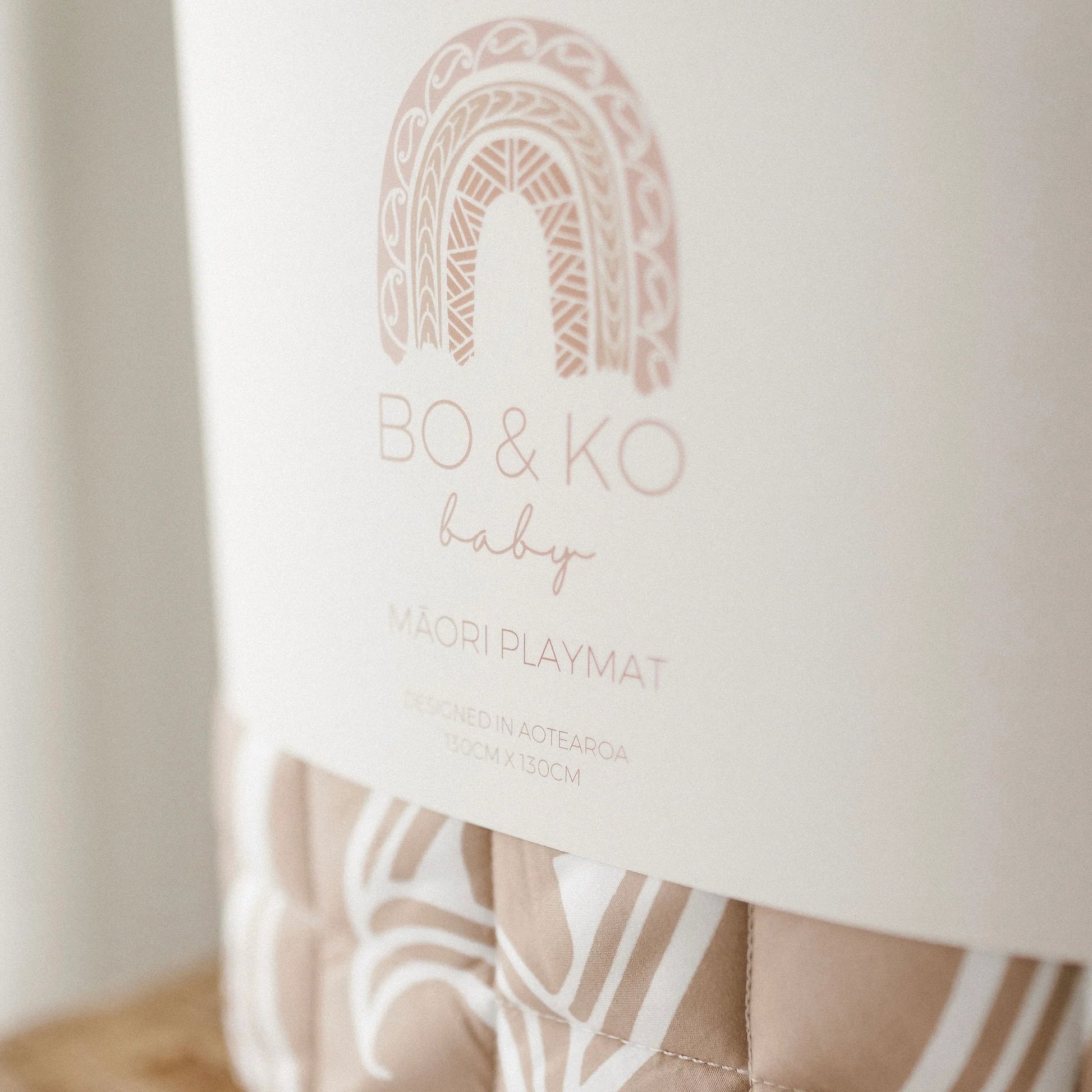 BO & KO Baby Māori Inspired Playmat | Tan available at Bear & Moo