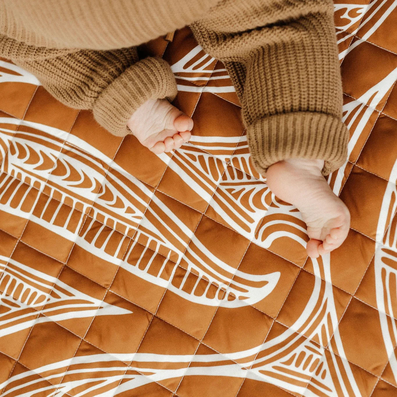 BO & KO Baby Māori Inspired Playmat | Rust available at Bear & Moo