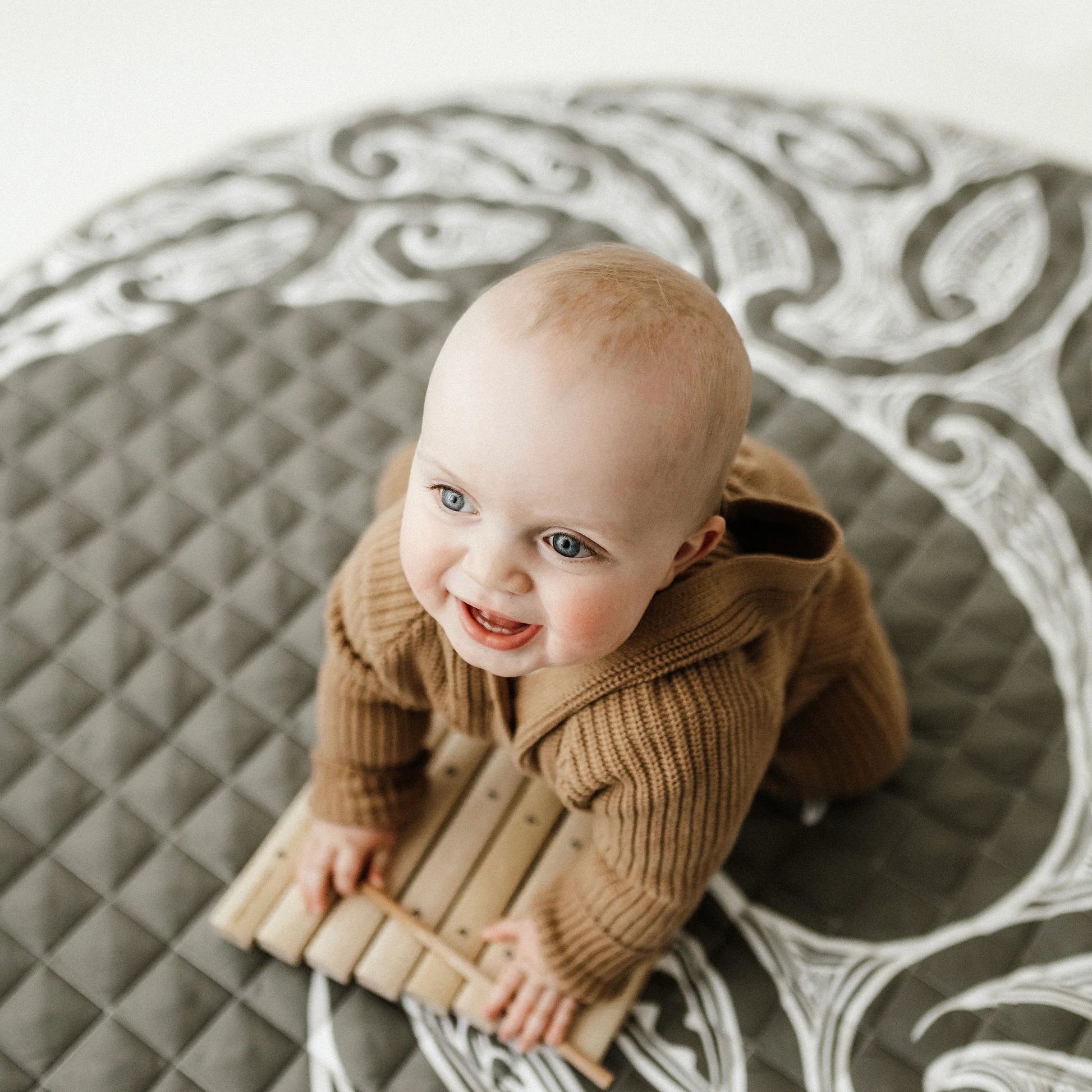 BO & KO Baby Māori Inspired Playmat | Olive available at Bear & Moo